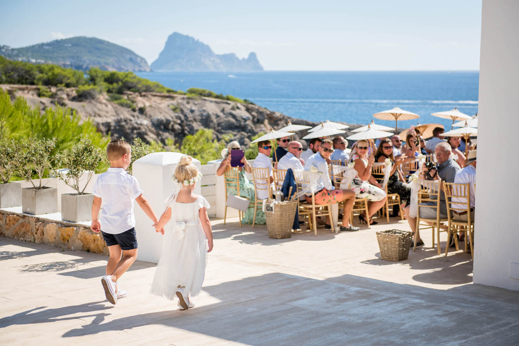 Flower girl and page boy at an Ibiza wedding in the summer